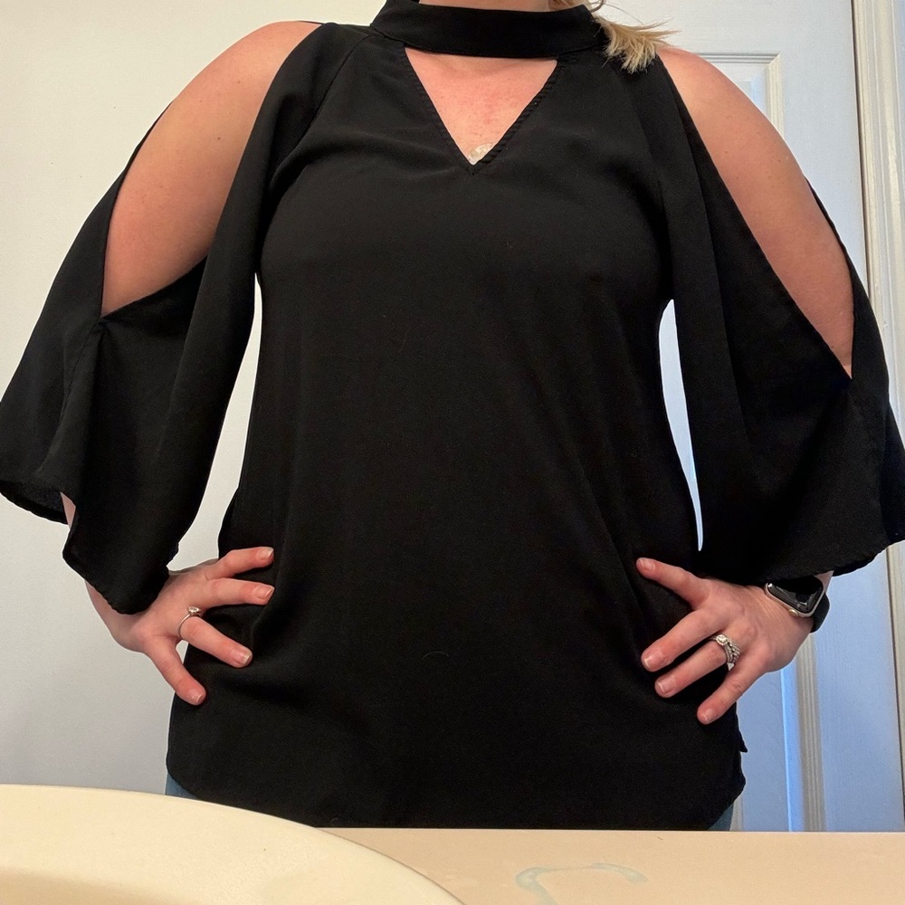 Mid length cut off blouse